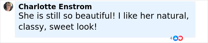 Pamela Anderson and Liam Neeson showing affection on the latest red carpet event, dressed elegantly.