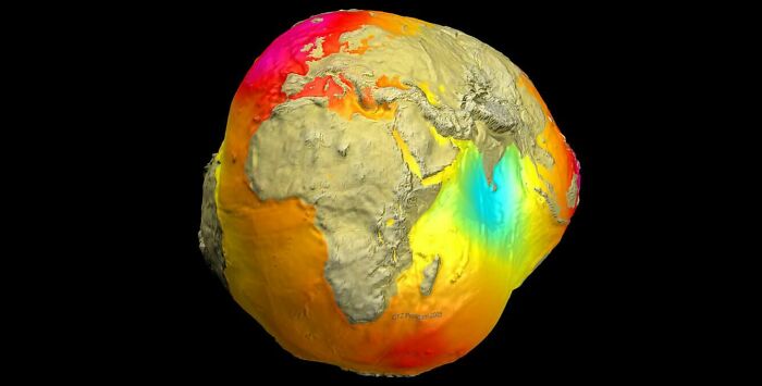 3D infographic of Earth showing topographic and ocean depth data with vibrant colors highlighting elevation changes.