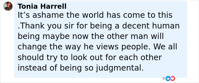 Screenshot of a Facebook comment expressing disappointment over racism and urging kindness and understanding among people.