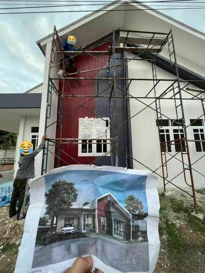 Workers in scaffolding painting a house incorrectly compared to the engineering design plan, showcasing construction mistakes.