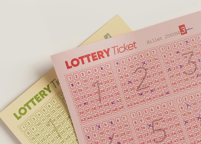 Pink and yellow lottery tickets filled out with multiple numbers marked, illustrating trends in overconsumption. - 28