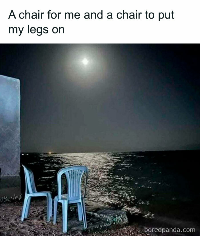 Two plastic chairs by the water at night under the moonlight, illustrating funny memes about not taking life seriously.