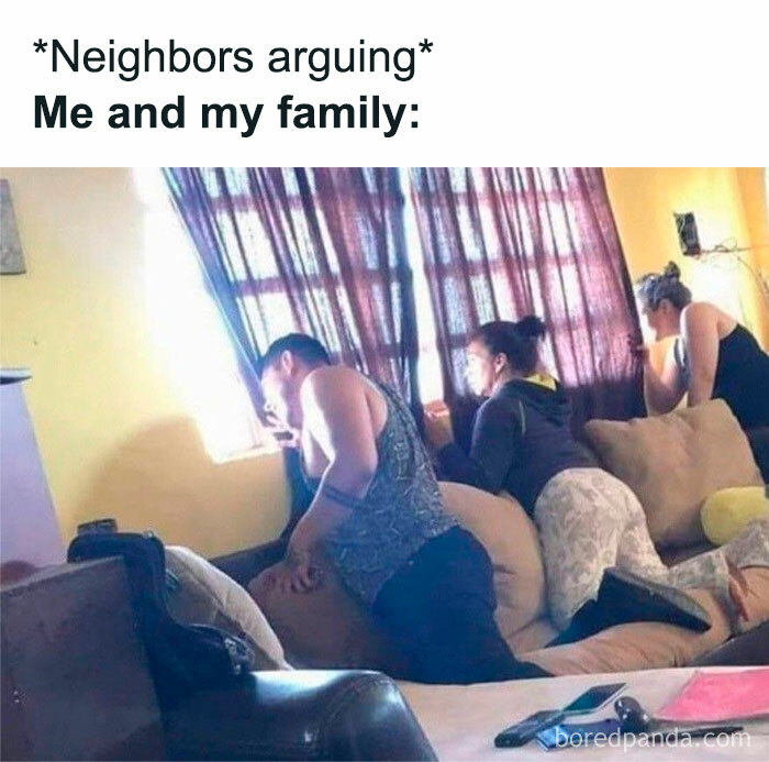 Family leaning on a couch looking out a window, funny memes reminding you not to take life too seriously.