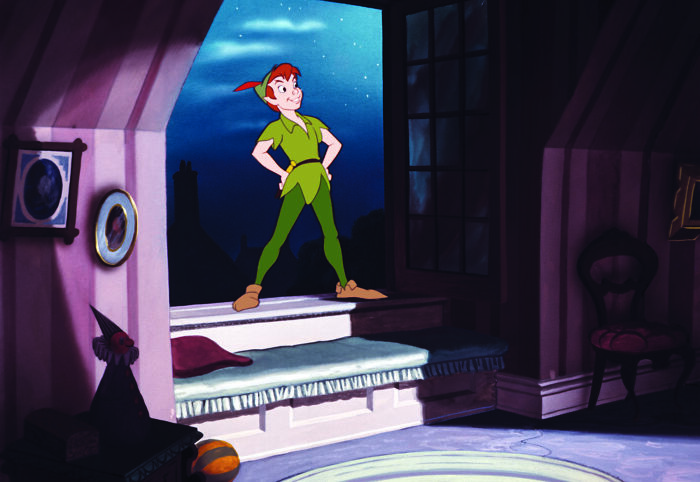 Peter Pan standing confidently in a dark room with a window, part of a Rate Disney Movies poll on classic animation scenes.