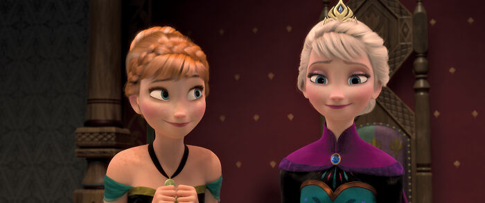 Anna and Elsa from a Disney movie scene, featured in a rate Disney movies poll discussing favorites and opinions.