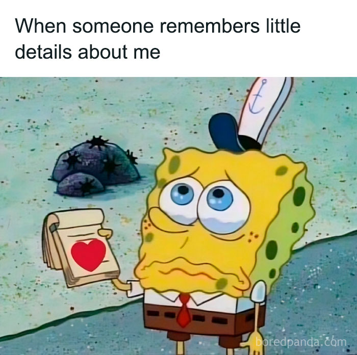 SpongeBob looking emotional while holding a notepad with a heart, illustrating social anxiety memes feelings.