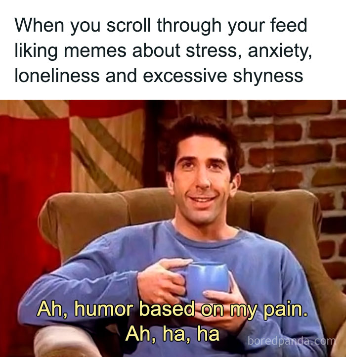 Man holding a cup sitting on a couch with a caption about liking social anxiety memes related to stress and shyness.