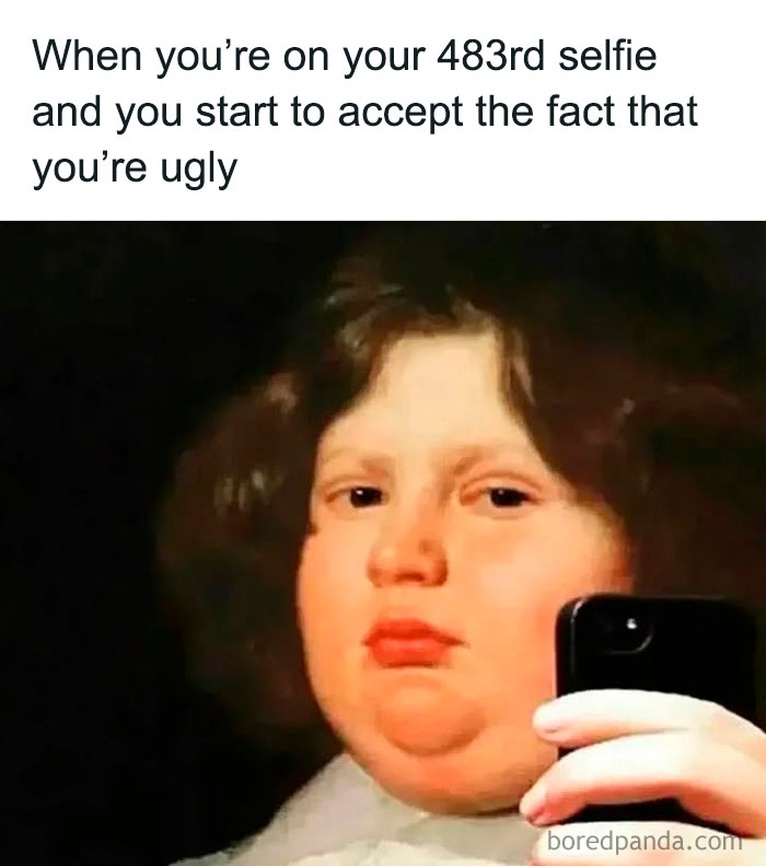 A person taking a selfie with a serious expression, illustrating relatable social anxiety memes about self-perception.