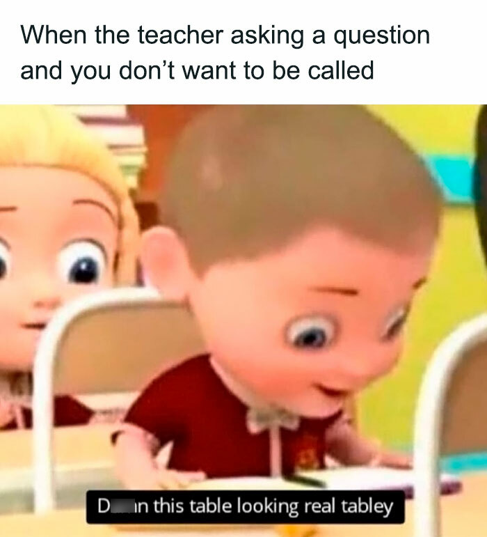 Child in animated classroom looking down nervously at table with humorous caption about social anxiety memes.