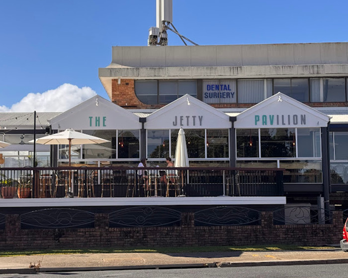 The Jetty Pavilion, a popular Australian restaurant with outdoor seating on a clear sunny day.