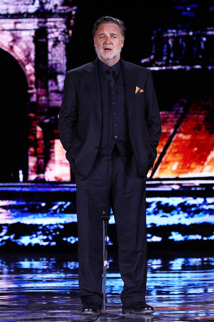 Russell Crowe in a black suit with gold pocket square, appearing slim during a recent public outing amid Ozempic time discussion. Russell Crowe in a black suit with gold pocket square, appearing slim during a recent public outing amid Ozempic time discussion.