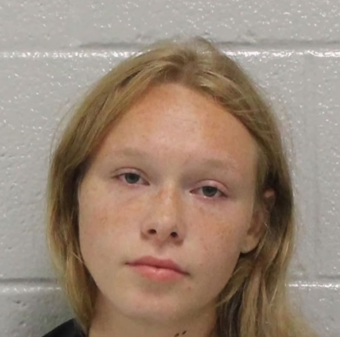 Mugshot of a 17-year-old girl suspected by cops after a chilling eulogy linked to the slaying of her parents in their sleep