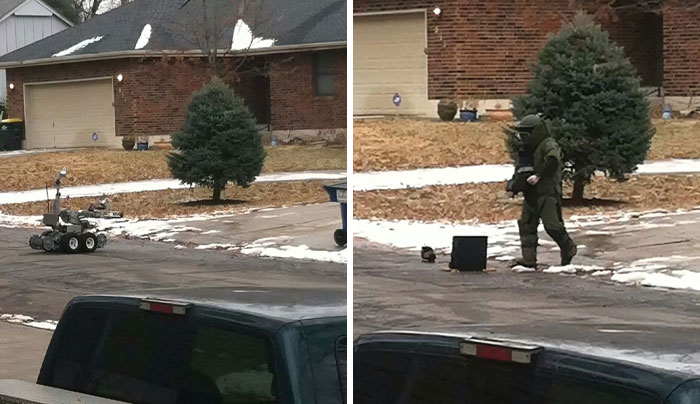 Robot and person in b**b disposal suit inspecting a suspicious item on a suburban street in a neighbor tales story.