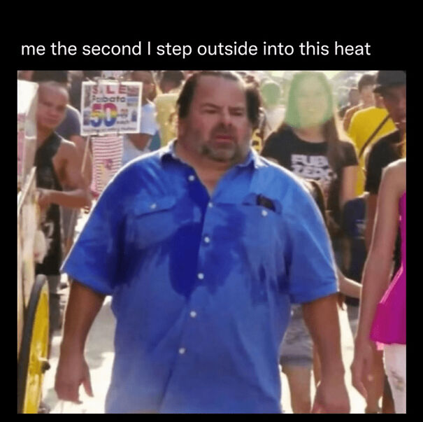 Man in a blue shirt sweating heavily outside, illustrating the struggle in funny summer memes about heat and being outdoors.