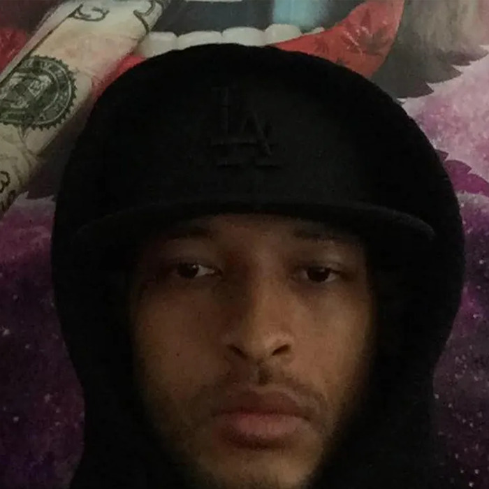 Close-up of a man wearing a black cap and hoodie, related to viral serial pervert arrest in a public incident. Close-up of a man wearing a black cap and hoodie, related to viral serial pervert arrest in a public incident.