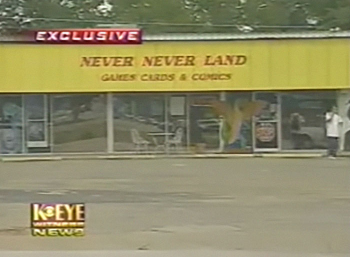 Gaming store Never Never Land with yellow sign, involved in mom closing down store after swords sold to son. - 11