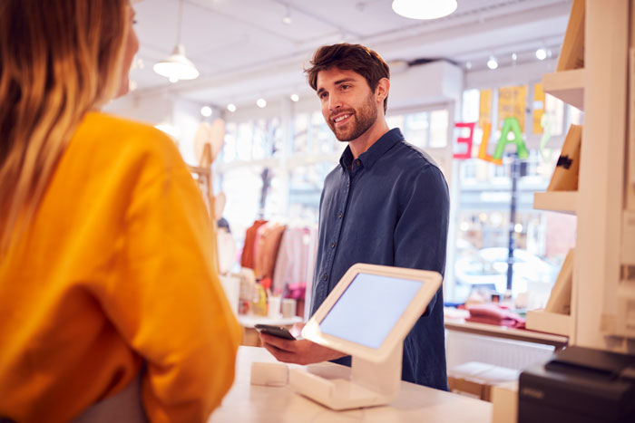 Man reveals Stargate spoilers to shop employee at register, unaware of the payback he will receive in return.