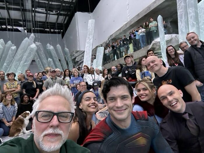 Cast and crew of the woke Superman reboot posing for a group selfie on set amid early negative reviews.