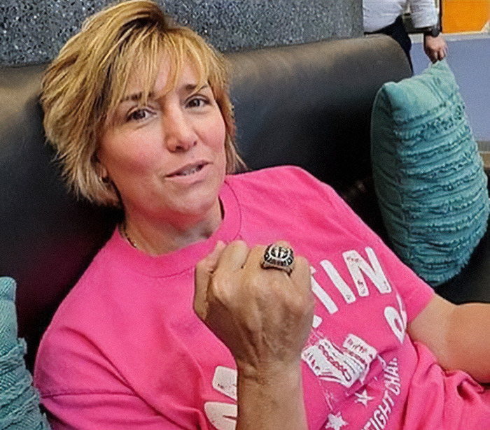 Person in a pink shirt showing a boxing ring, highlighting Sydney Sweeney's dramatic body transformation for legendary boxer role. Person in a pink shirt showing a boxing ring, highlighting Sydney Sweeney's dramatic body transformation for legendary boxer role.