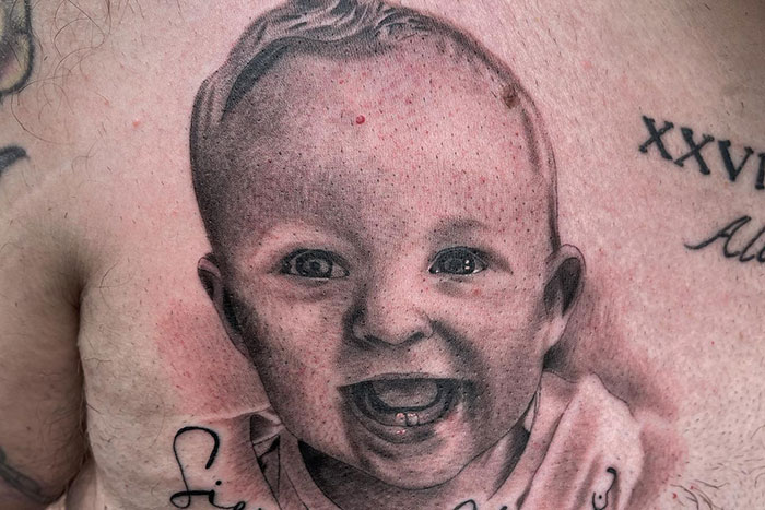 Realistic baby portrait tattoo on chest, showcasing detailed work from tattoo artists sharing jobs they decline on moral grounds.
