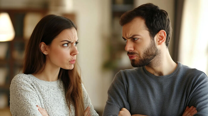 A young woman and man showing frustration and distrust, reflecting patience and trust slowly disappearing from the good old days.