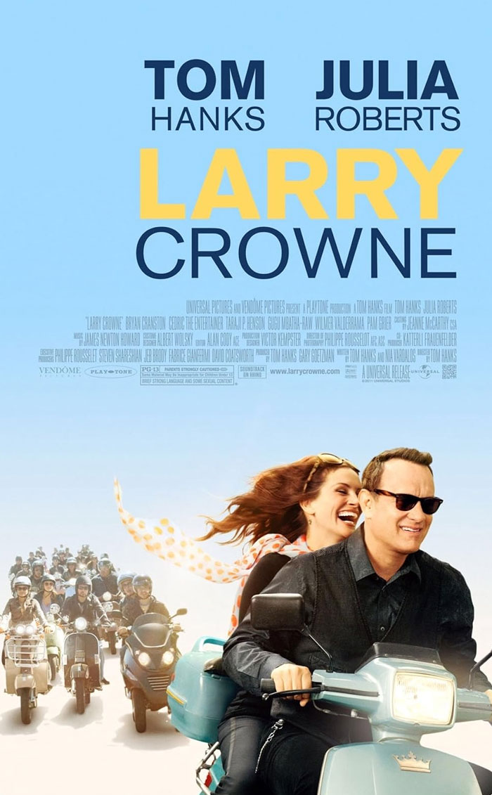 Tom Hanks and Julia Roberts riding a scooter in the underrated movie Larry Crowne with a group of riders behind them.