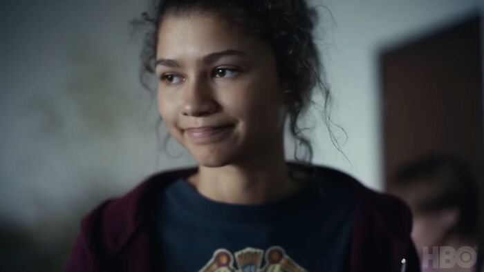 Young woman with a thoughtful expression, representing characters that are very hard to love in TV shows. - 7