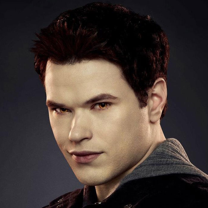 Emmett with dark hair and intense amber eyes wearing a jacket, representing rare boy names for stand-out babies.