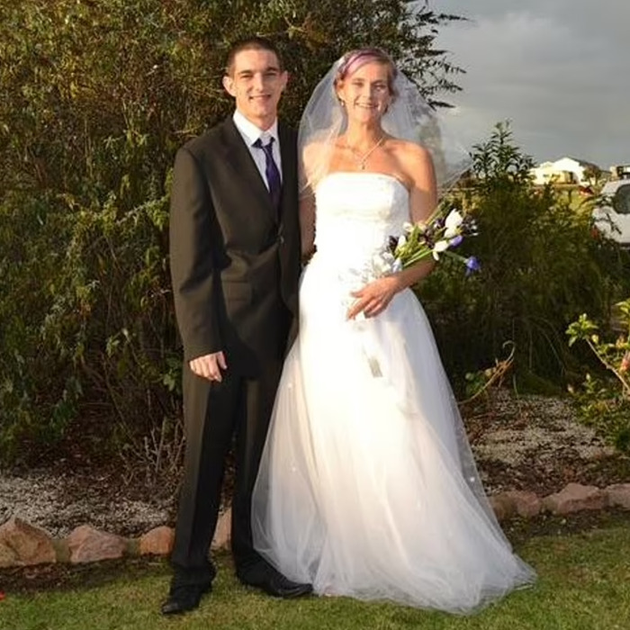 Wedding photo of a bride and groom outdoors, illustrating the innocent dad wrongly accused by vigilante punishment. - 2