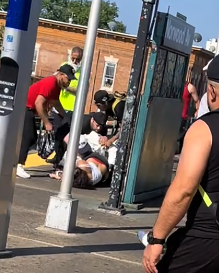 Men deliver vigilante justice on subway platform after brute attacked woman, with bystanders intervening in viral video.