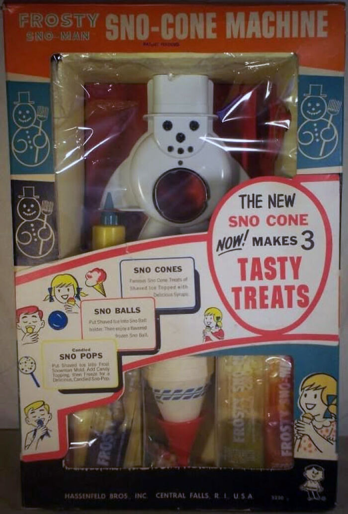 Vintage sno-cone machine with snowman design, colorful syrup bottles, and retro packaging from classic 123 vintage things collection