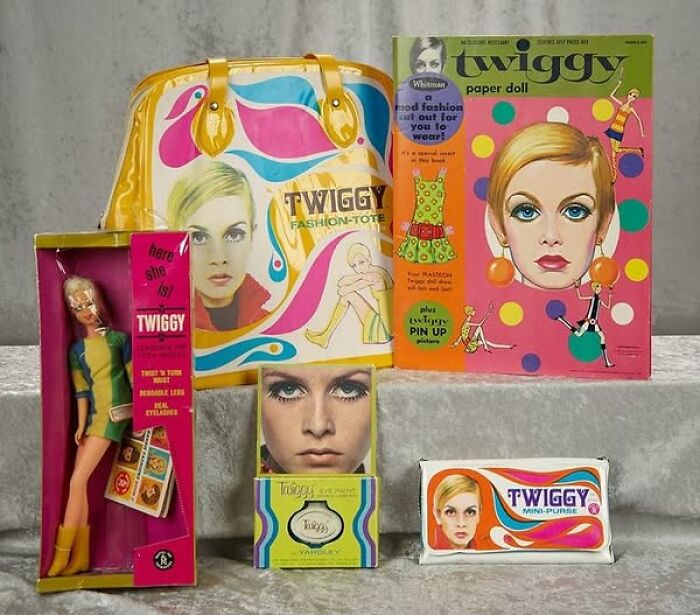Vintage Twiggy memorabilia including fashion tote, paper doll, doll in box, and eye makeup, showcasing unique vintage things collection.