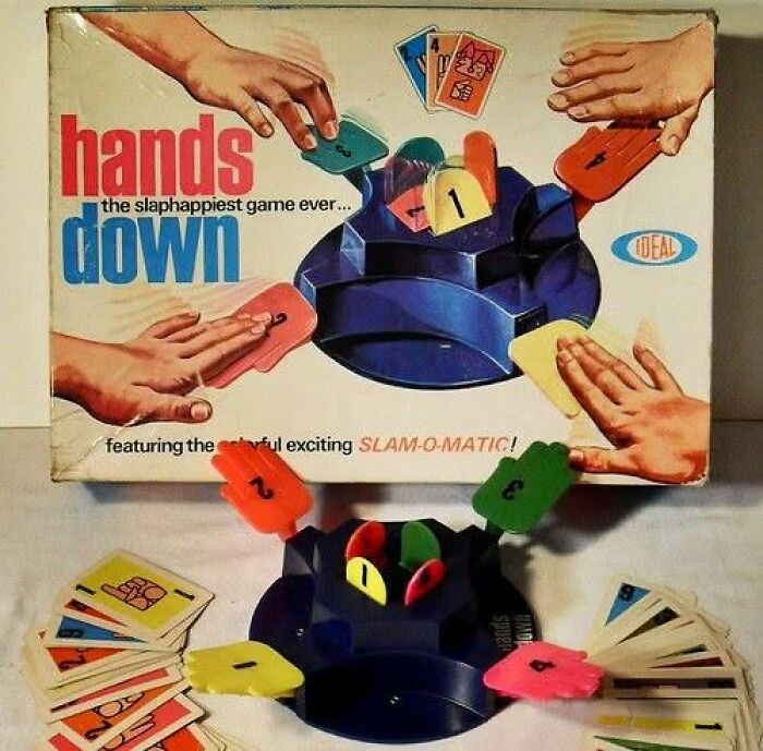 Vintage hands down game with colorful plastic hand-shaped cards and a slam-o-matic spinner, a classic vintage thing