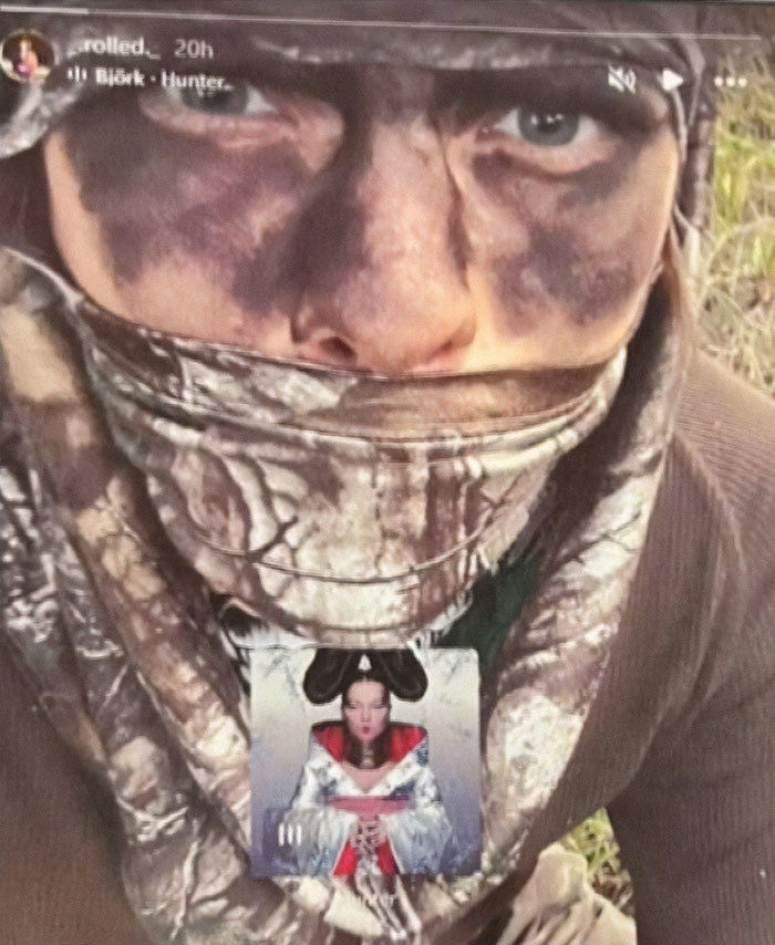 Close-up of a teen wearing camouflage face paint and clothing in an ominous Instagram story before Idaho shooting incident.