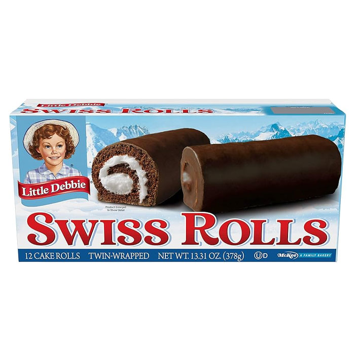 Little Debbie Swiss Rolls American foods banned in other countries shown with chocolate cake and cream filling.