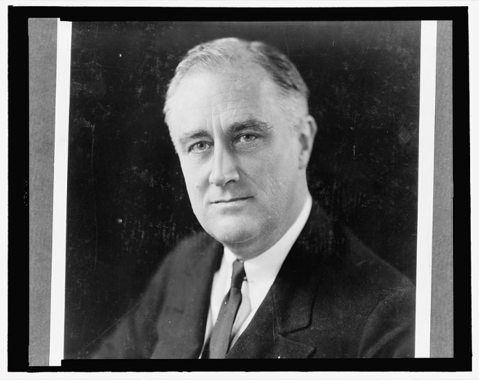 Black and white portrait of US president Franklin D. Roosevelt highlighting highest IQ rankings among top 12 presidents in history