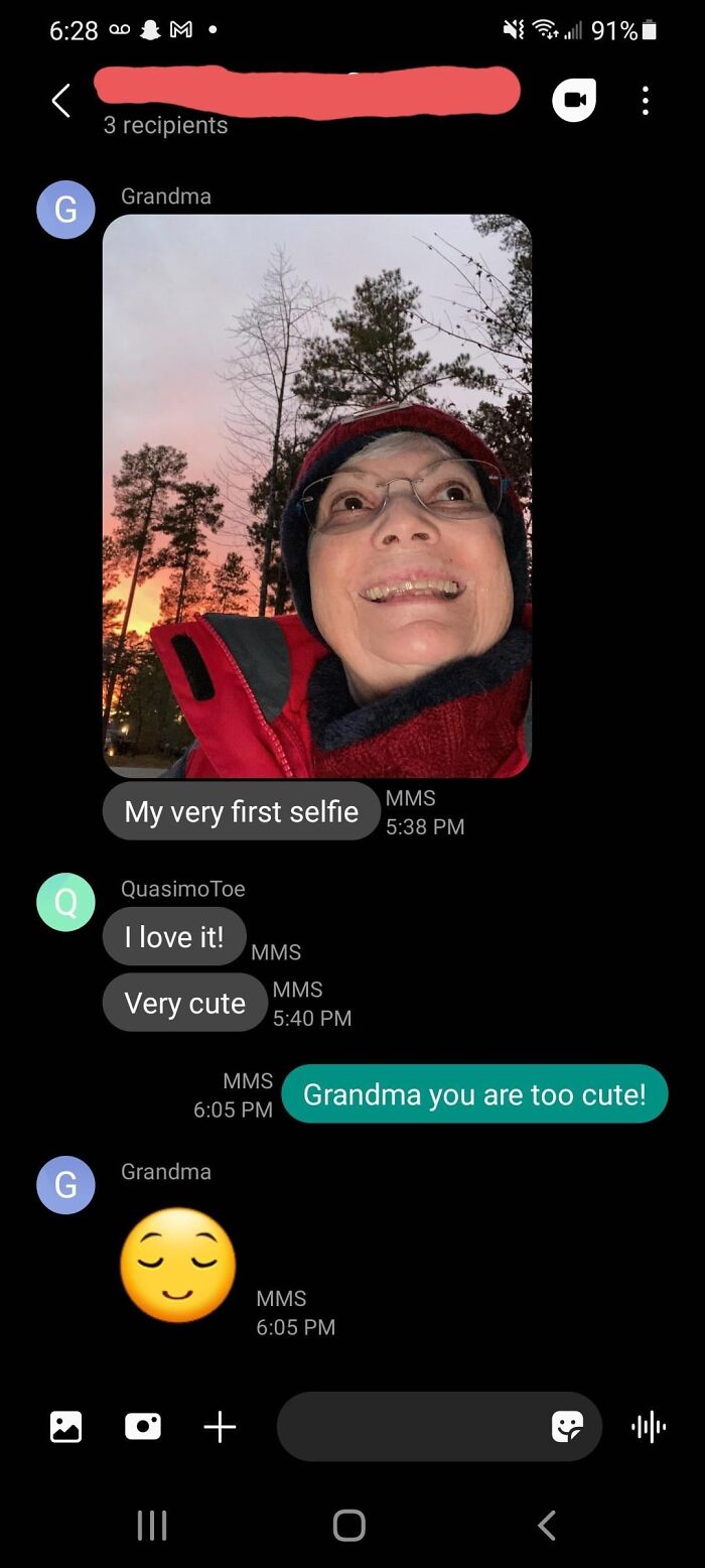 Grandma's first selfie shared in a text chat, capturing a wholesome moment that brightens the day.