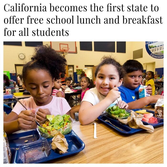 Children enjoying free school lunch in a cafeteria, highlighting wholesome people making the world a better place together