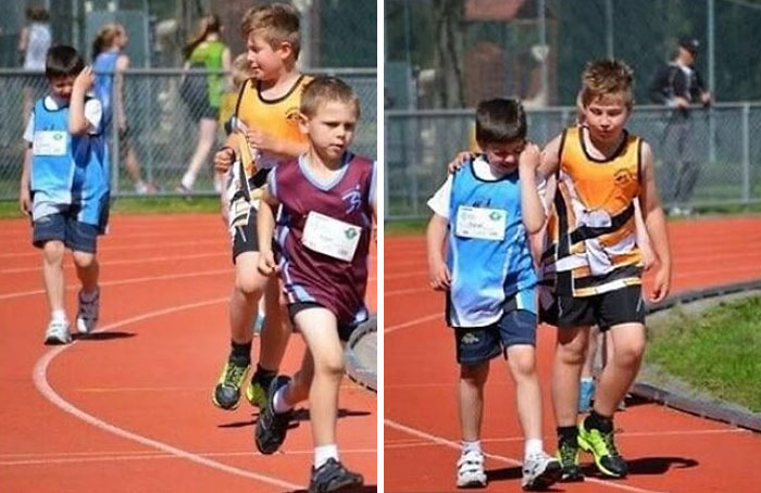 Young boys running and walking together on a track showing wholesome moments of people making the world better place