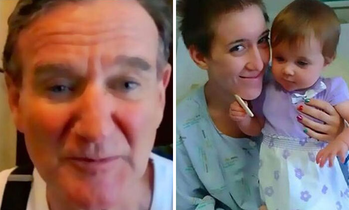 Man smiling in a close-up beside a young woman holding a baby, capturing a wholesome and amazing family moment.