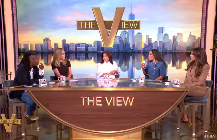 Panelists on The View discussing Whoopi Goldberg defending CEO Andy Byron amid Coldplay kiss cam cheating controversy.
