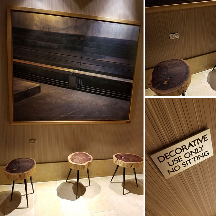 Wooden stools in hotel lobby with a sign saying decorative use only, highlighting hotel design mistakes and guest frustration.