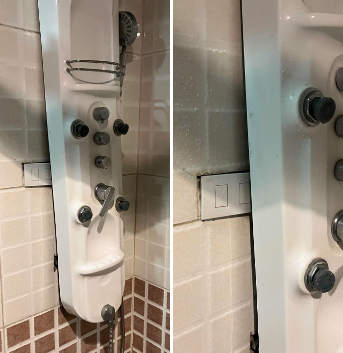 Shower panel blocking hotel bathroom light switch, showing a common hotel design fail that prompted guest complaints online.