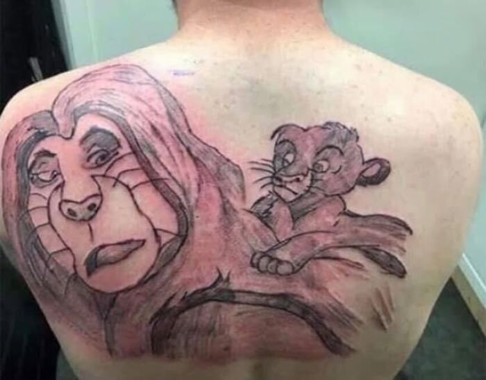 Poorly executed Lion King tattoo on a person's back, featured among abysmally bad tattoos shared on Facebook pages.
