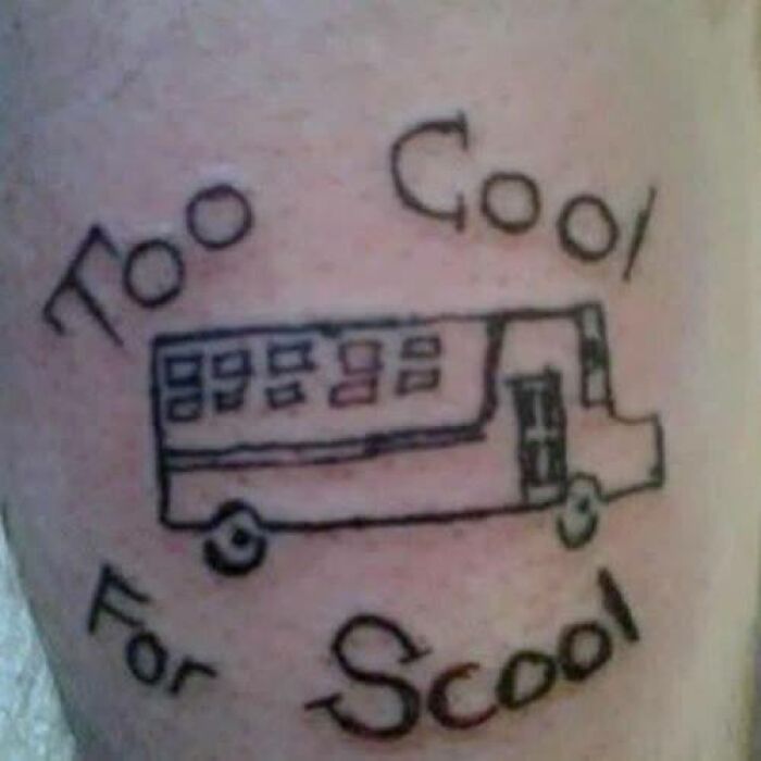 Tattoo with misspelled phrase and a bus drawing showcasing one of the worst bad tattoos shared on dedicated Facebook pages.