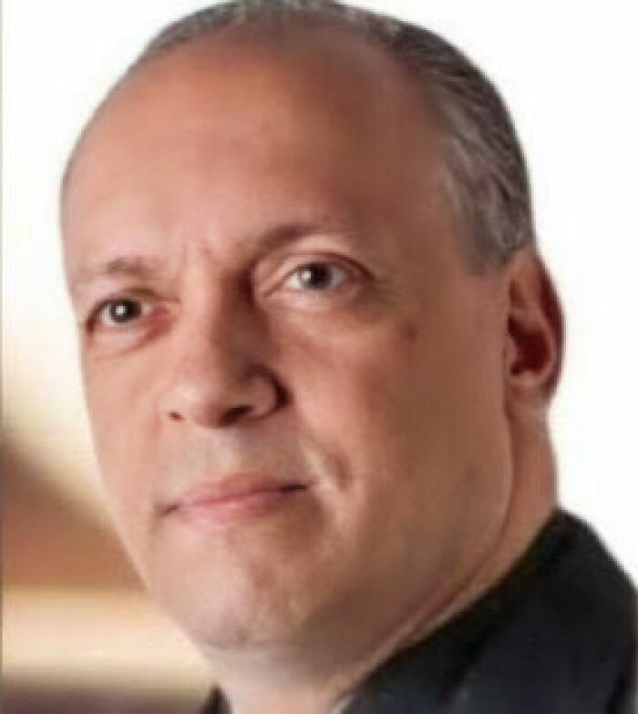 Close-up of a man believed to be a pastor involved in a thong and wig incident, sparking memes and online reactions. Close-up of a man believed to be a pastor involved in a thong and wig incident, sparking memes and online reactions.