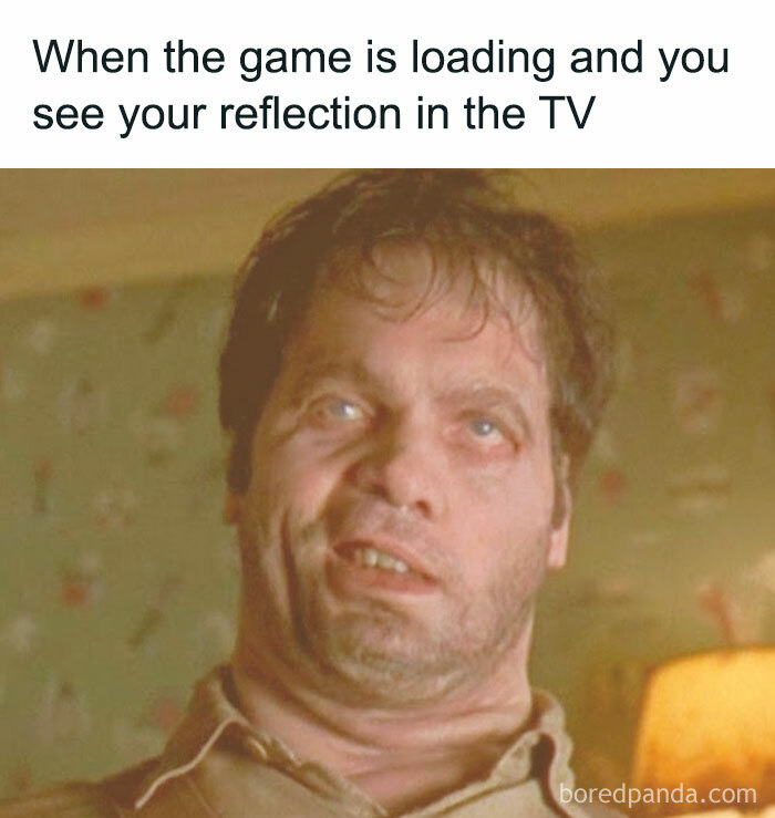 Man with creepy expression reacting to seeing his reflection on TV screen, fitting creepy funny memes humor coffee theme.