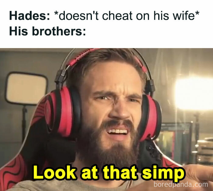 Man with a beard and red headphones reacting with confusion in a chaotic mythology meme about Hades and his brothers.