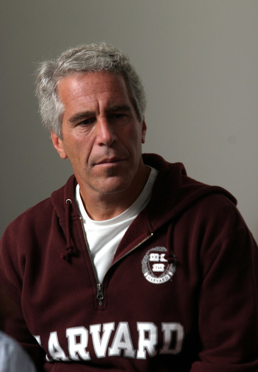 Epstein in a maroon Harvard hoodie, sitting indoors, representing the Epstein Island allegations context for Stephen Hawking fact separation.