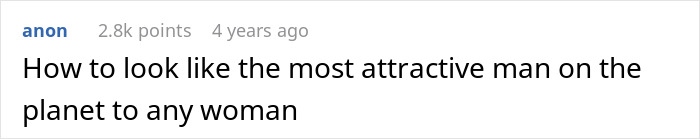 Man feeding a small kitten gently while sitting in a subway train, showing kindness and care.